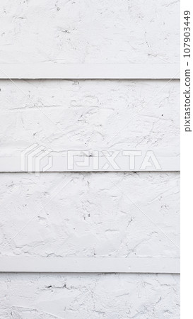 Close-up of a textured white concrete background Close-up of a textured white concrete background 107903449