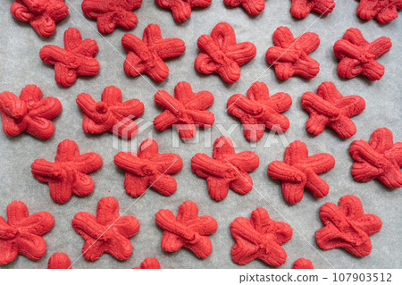traditional Chinese New Year red sand cookie, symbolizing luck traditional Chinese New Year red sand cookie, symbolizing luck 107903512