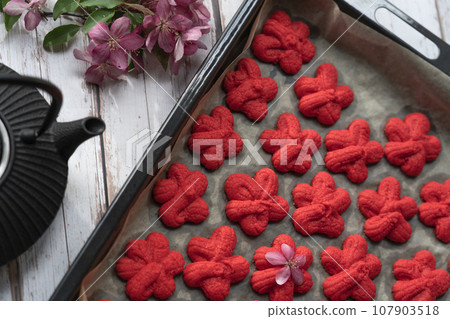 traditional Chinese New Year red sand cookie, symbolizing luck traditional Chinese New Year red sand cookie, symbolizing luck 107903518