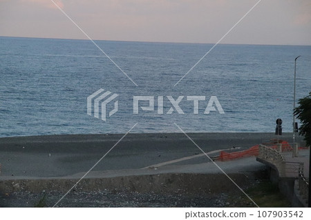 View of the Large Beach of Diamante, in the Background the Island of Cirella, Diamante, District of Cosenza, Calabria, Italy, Europe. View of the Large Beach of Diamante, in the Background the Island of Cirella, Diamante, District of Cosenza, Calabria, Italy, Europe. 107903542