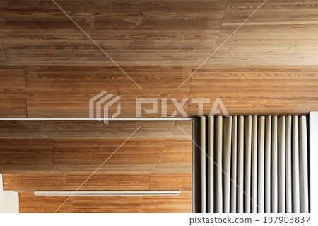 Abstract modern room interior details, white curtain mounted on wooden ceiling 107903837