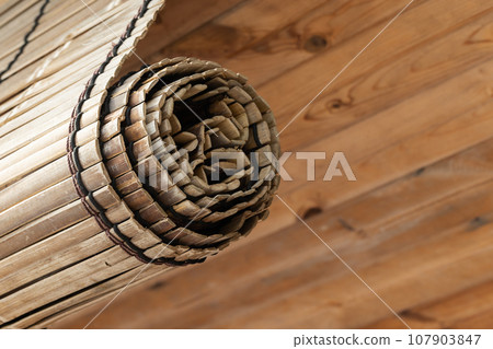 Wooden roller blind close up photo 107903847