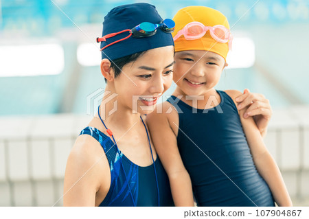 Kids swimming 107904867