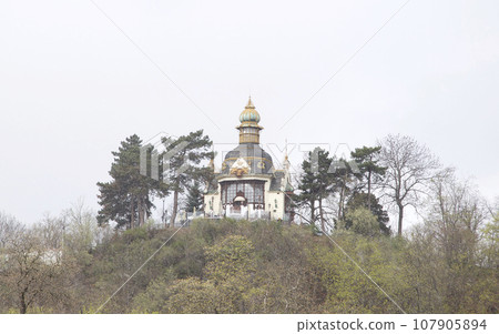 Hanavsky Pavilion in Prague, the capital of the Czech Republic. It was winter, and snow fell diagonally, creating a whitish, misty landscape. 107905894