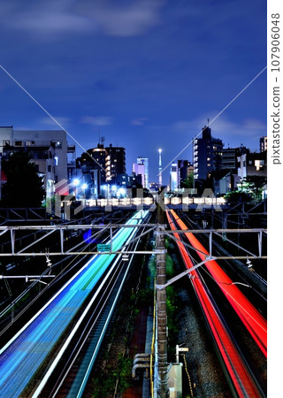 Ikebukuro - Railway light traces towards Skytree seen from Horinouchi Bridge 107906048