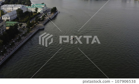 Panorama of city with beautiful architecture and river on sunny day. Stock footage. Beautiful modern city with river on sunny summer day. Urban landscape with panorama and modern buildings Panorama of city with beautiful architecture and river on sunny day. Stock footage. Beautiful modern city with river on sunny summer day. Urban landscape with panorama and modern buildings 107906538