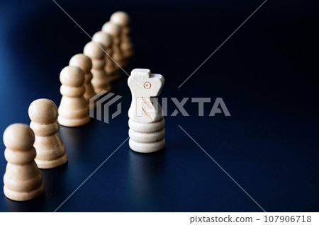Selective view of wooden white knight moving toward for battle. Strategy and tactic concept Selective view of wooden white knight moving toward for battle. Strategy and tactic concept 107906718