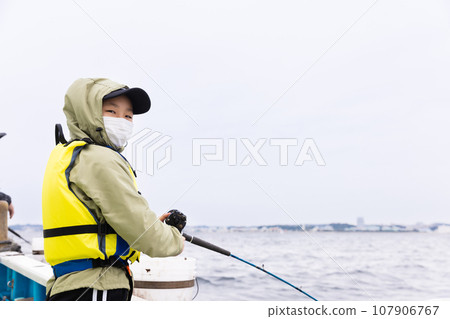 kids enjoying fishing 107906767