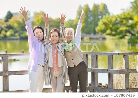 Senior woman enjoying travel Senior woman enjoying travel 107907439