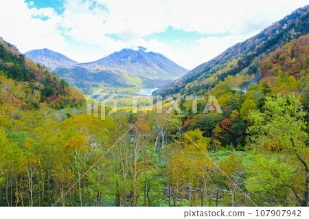 Mt. Nantai from Kinsei Pass in autumn Mt. Nantai from Kinsei Pass in autumn 107907942
