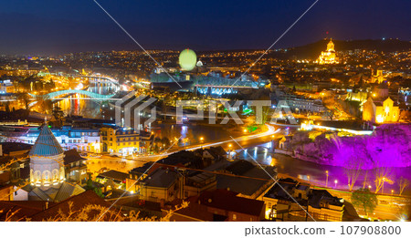 Night view of historical area of Tbilisi on Mtkvari River, Georgia 107908800