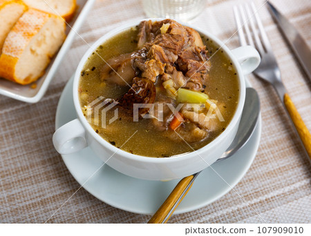 Top view of mushroom soup in bowl on table Top view of mushroom soup in bowl on table 107909010