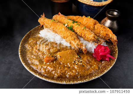 Japanese curry rice with fried shrimp Japanese curry rice with fried shrimp 107911450