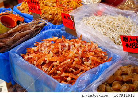 Dried shrimp sold at a dry food store in the west of Des Voeux Road, Hong Kong. Prices vary depending on the place of origin and size. 107911612