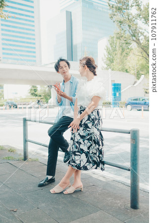 Men and women walking Men and women walking 107911762