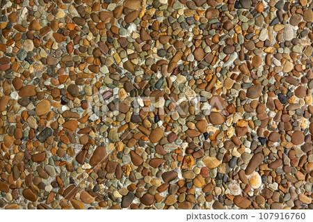 Texture brown sea pebbles Texture brown sea pebbles 107916760