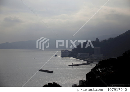 Silhouette of hotels and pier along the coast Silhouette of hotels and pier along the coast 107917940