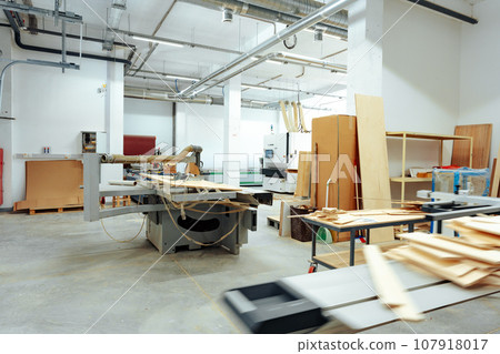 Interior of large workshop of contemporary furniture factory Interior of large workshop of contemporary furniture factory 107918017