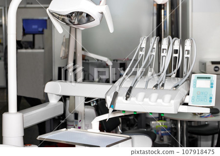 Medical equipment of a dentist's office with close-up. 107918475