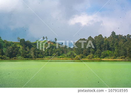 Telaga Warna, a mystical lake in Dieng, Indonesia. Telaga Warna, a mystical lake in Dieng, Indonesia. 107918595