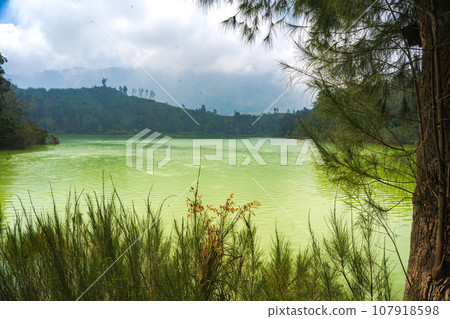Telaga Warna, a mystical lake in Dieng, Indonesia. Telaga Warna, a mystical lake in Dieng, Indonesia. 107918598