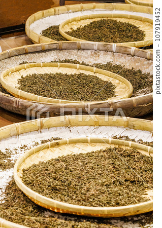 Tea leaves being exposed to the sun Tea leaves being exposed to the sun 107919452