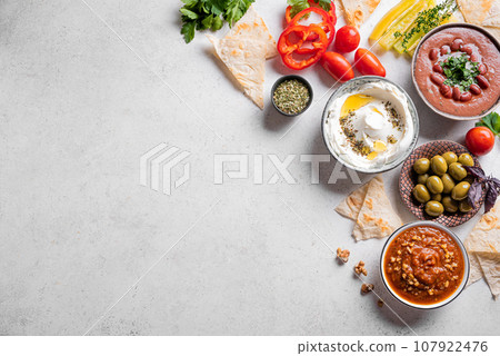 Arabic breakfast or mezze dips 107922476