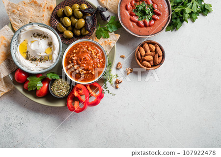Arabic breakfast or mezze dips 107922478