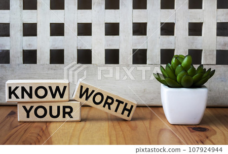 Know Your Worth on wooden blocks. Self motivation coaching HR concept. 107924944