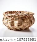 Empty wicker basket fruit or bread basket on white background. Vintage basket. 107926961