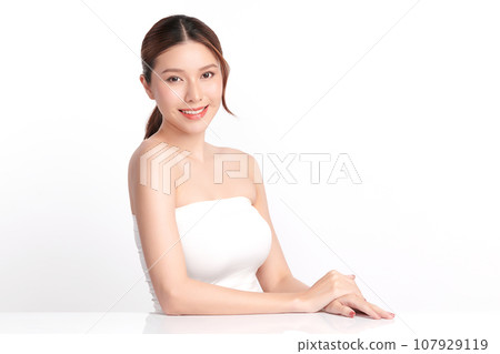 Beautiful young asian woman with clean fresh skin on white background, Face care, Facial treatment, Cosmetology, beauty and spa, Asian women portrait. 107929119