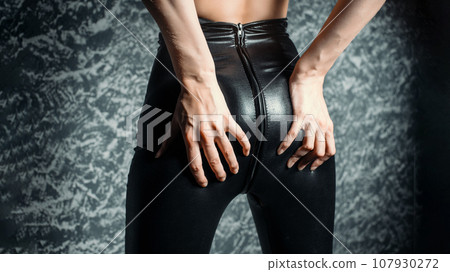 Sexy woman ass in black leather pants Sexy woman ass in black leather pants 107930272