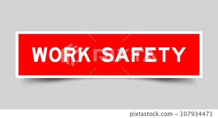Sticker label with word work safety in red color on gray background 107934471