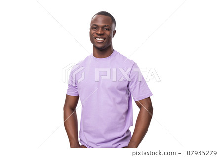 young shy handsome american man dressed in a light lilac basic t-shirt on a white background with 107935279