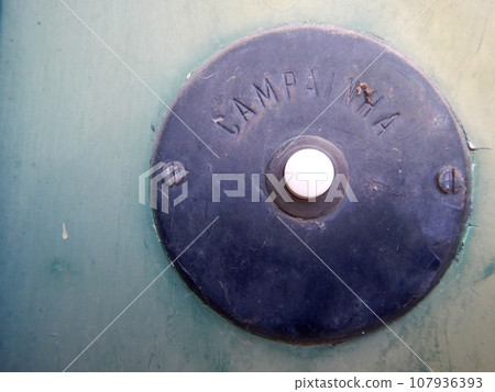 Old home doorbell knocker pusher 107936393