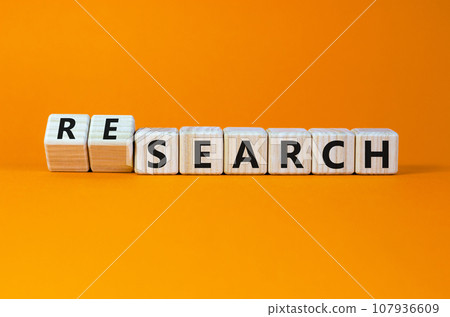 Search or research symbol. Turned wooden cubes and changed the word search to research. Business and search or research concept. Beautiful orange background, copy space. Search or research symbol. Turned wooden cubes and changed the word search to research. Business and search or research concept. Beautiful orange background, copy space. 107936609