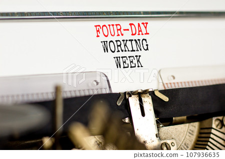 Four-day working week symbol. Concept words Four-day working week on white paper typed on old retro typewriter on beautiful white background. Business and four-day working week concept. Copy space. Four-day working week symbol. Concept words Four-day working week on white paper typed on old retro typewriter on beautiful white background. Business and four-day working week concept. Copy space. 107936635