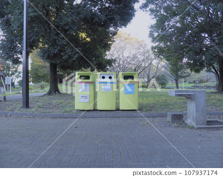 Trash can installed in the park 107937174