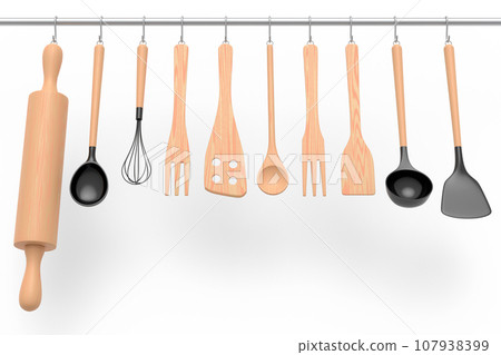 Set of kitchen utensil for preparation of dough hanging on shelf on white. 107938399