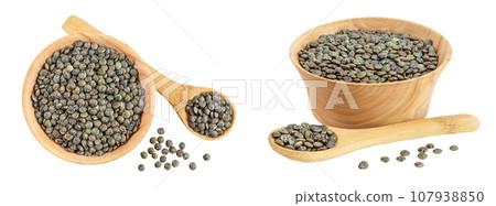 raw french green lentils in wooden bowl isolated on white background. Top view. Flat lay 107938850