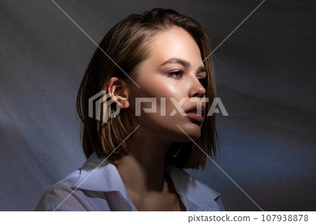 Beautiful Young Woman with Clean Fresh Skin 107938878