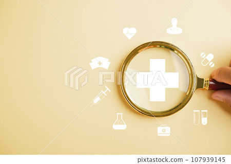 Health insurance in focus, Magnifying glass highlights plus symbol and healthcare icon. Showcases welfare health access, innovation, and quality care. health concept 107939145