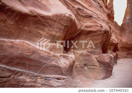 Kayon Sik. A close-up view of the winding road and undulating canyon walls. Petra Jordan 107940581