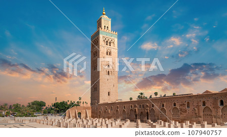 Koutoubia Mosque during sunset. Located at Marrakesh medina quarter, it is the largest and most iconic mosque in Marrakesh, Morocco. 107940757