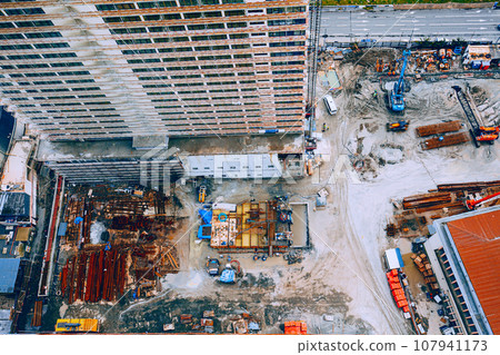 Development Multistorey Residential Building construction area. development on construction site. flat view Construction And bulding industry concept 107941173