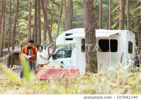 Couple enjoying camping Couple enjoying camping 107942140