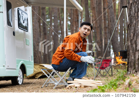 Men enjoying camping 107942150