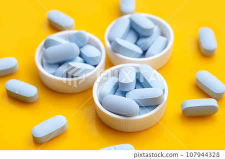 "PrEP" ( Pre-Exposure Prophylaxis) used to help protect people from HIV, yellow background. "PrEP" ( Pre-Exposure Prophylaxis) used to help protect people from HIV, yellow background. 107944328