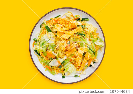 Chinese-styled fried noodle. Asian cuisine Chinese-styled fried noodle. Asian cuisine 107944684