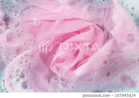 Clothes soak in powder detergent water dissolution, washing colored clothes 107945024